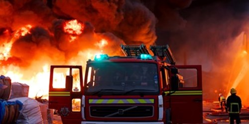 Image of a fire engine and a fire