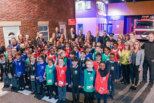Image of Delegates and young people at the safety centre.